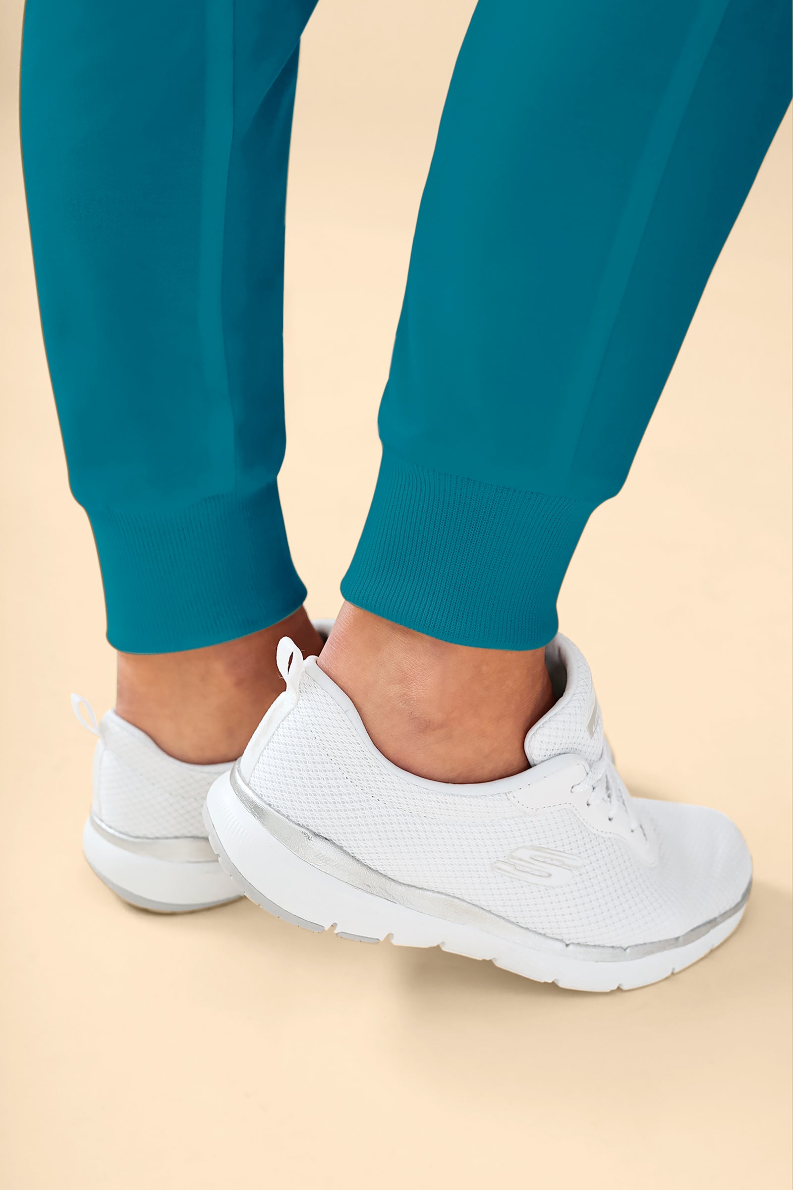 KAERE Hose Damen - Saumbündchen Kurzgr. mit Beintaschen petrol