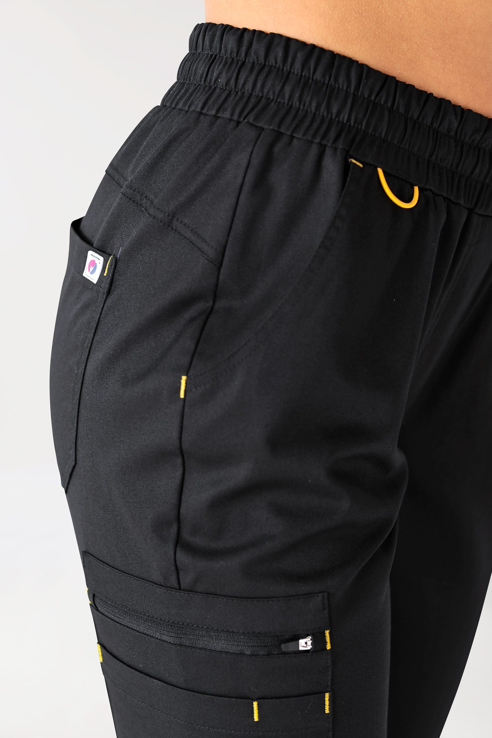 CLINIC STRETCH Hose Damen - Strickbund schwarz/gelb